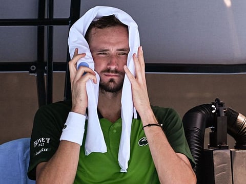 Russia's Daniil Medvedev keeps cool during a break in his men's singles match against France's Terence Atmane in Melbourne on