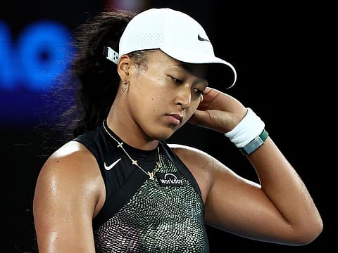 Japan's Naomi Osaka reacts after losing against France's Caroline Garcia in the women's singles on Monday.