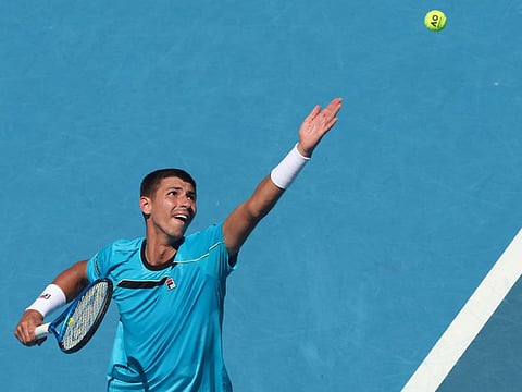 Australia's Alexei Popyrin serves against compatriot Marc Polmans during their men's singles match on Monday.