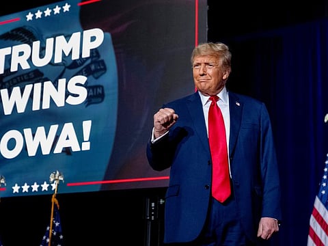 Republican presidential candidate former President Donald Trump takes the stage at a caucus night party in Des Moines, Iowa, ON JanUARY 15, 2024.