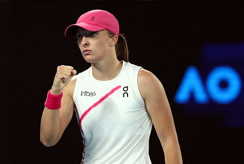 Poland's Iga Swiatek celebrates after winning her second round match against Danielle Collins.