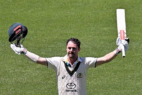 Australias Travis Head celebrates his century during day two of the first Test against the West Indies in Adelaide on Thursday.