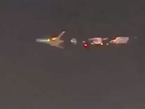 Flames seen shooting out from Atlas Air Boeing 747-8 engine flying over Miami.