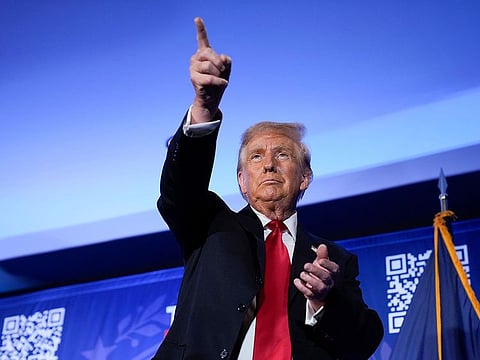 Republican presidential candidate former President Donald Trump gestures after speaking at a campaign event in Portsmouth, N.H., Wednesday, Jan. 17, 2024.