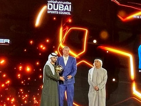 Erling Haaland of Manchester City receives the Best Men's Player of the Year Award at the Dubai Global Soccer Awards, organised by the Dubai Sports Council in Atlantis, The Palm, on Friday.
