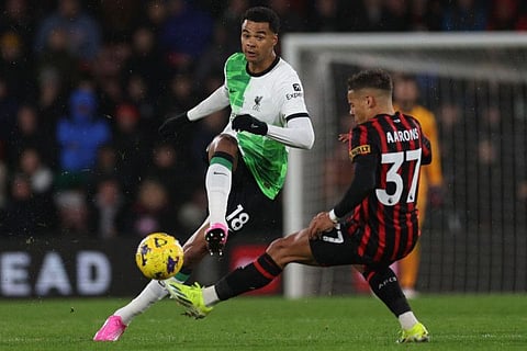 Liverpool's striker Cody Gakpo (left) vies with Bournemouth's defender Max Aarons during the English Premier League match at the Vitality Stadium in Bournemouth on Sunday.