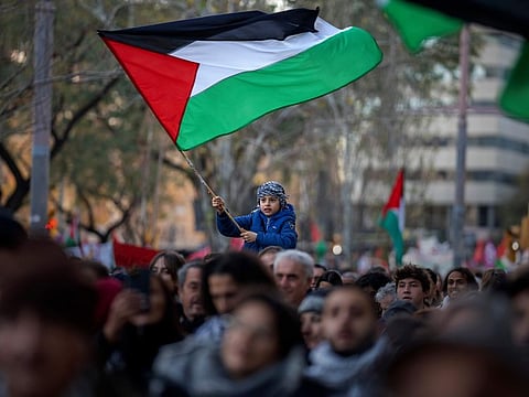 Demonstrators march in solidarity with Palestinians calling for an immediate ceasefire in Gaza, in Barcelona, on January 20, 2024.