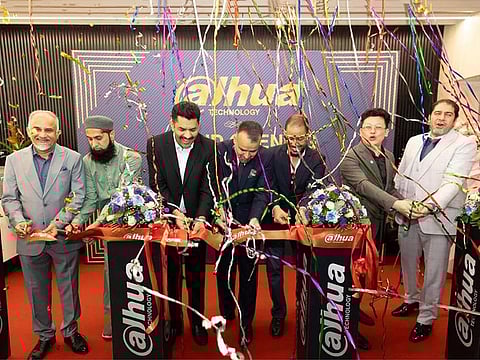 Dahua MENA CEO Yacob Bai cuts the ribbon at the grand opening of their new office in Dubai on Tuesday along with chief executives and directors of Dahua's key partners and distributors in the region.