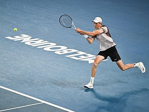 Italy's Jannik Sinner returns to Russia's Andrey Rublev during their men's singles quarter-final match on day 10 of the Australian Open in Melbourne on Tuesday.