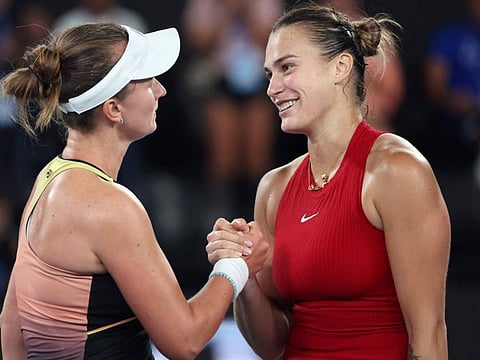 Aryna Sabalenka, right, of Belarus is congratulated by Barbora Krejcikova of the Czech Republic following their quarterfinal match at the Australian Open at Melbourne Park, Melbourne, Australia, on Tuesday.