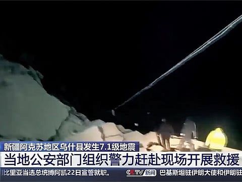 This image taken from video footage run by China's CCTV, shows a landslide caused by an earthquake blocks a highway in Kizilsu Kirghiz Autonomous Prefecture, China’s western Xinjiang region on Tuesday, January 23, 2024.