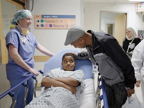 In this image from video provided by the Children’s Hospital of Philadelphia, the 11-year-old boy Aissam Dam who was born with hereditary deafness prepares for a gene therapy procedure in Philadelphia in October 2023.