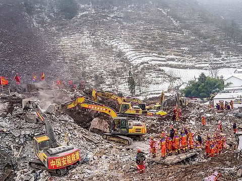 Rescuers carry out operations in Liangshui Village, Tangfang Town in the city of Zhaotong in southwestern China's Yunnan Province.