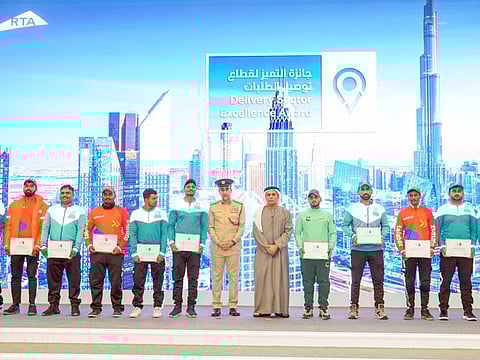 Mattar Al Tayer and Lieutenant General Abdullah Khalifa Al Marri at the ceremony to honour the best delivery riders in Dubai.