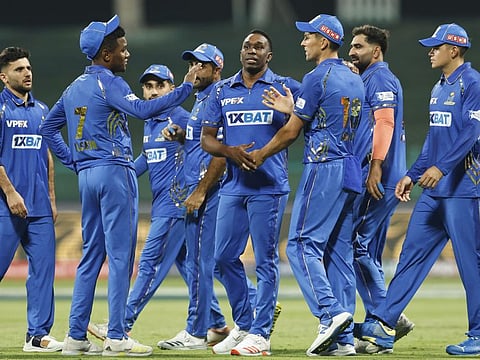 Dwayne Bravo of MI Emirates celebrates the wicket of James Vince of Gulf Giants during the match 4 of the DP World International League T20 at the Zayed Cricket Stadium, Abu Dhabi.