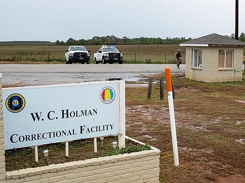 The gate at Holman Correctional Facility is monitored by law enforcement before the scheduled execution by asphyxiation using pure nitrogen of Kenneth Eugene Smith who is convicted for a murder-for-hire committed in 1988, in Atmore, Alabama, on January 25, 2024.