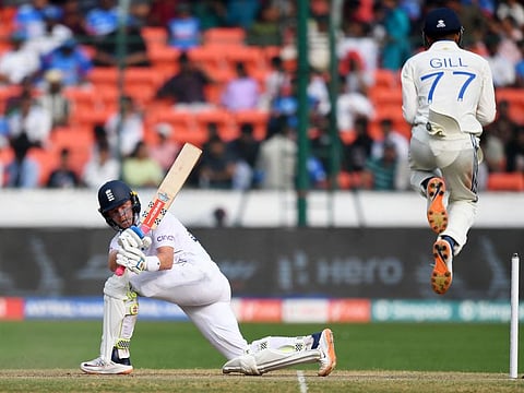 England's Ollie Pope (left) in action during the third day of the first Test match against India at the Rajiv Gandhi International Stadium in Hyderabad on Sunday.
