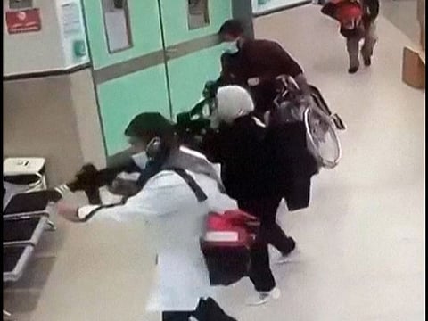 This grab taken from UGC video released on social media on January 30, 2024 shows CCTV footage displayed on a computer screen reportedly of a deadly raid by undercover Israeli troops at the Ibn Sina hospital in the city of Jenin in the occupied West Bank.