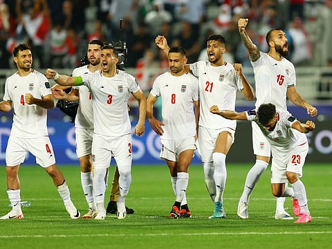 Iran players celebrate after Mehdi Torabi scores during a penalty shootout of the AFC Asian Cup Round of 16 match against Syria at Abdullah Bin Khalifa Stadium, Doha, Qatar on Wednesday.