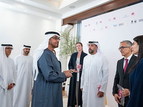 President His Highness Sheikh Mohamed bin Zayed Al Nahyan speaks with representatives of organisations that have received the Parent-friendly Label, at Al Shati Palace. Seen with Sheikh Theyab bin Mohamed bin Zayed Al Nahyan, Chairman of the Office of Development and Martyrs Families Affairs at the Presidential Court and Dr Mugheer Khamis Al Khaili Abu Dhabi Executive Council Member and Chairman of the Department of Community Development.