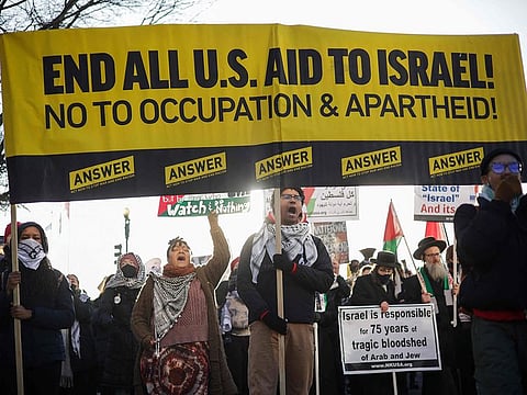 Pro-Palestinian activists hold a rally at Union Station on February 01, 2024 in Washington, DC. The group of activists held several protests around the city in an attempt to shutdown the morning commute as they called for a ceasefire in the Israel-Hamas war.