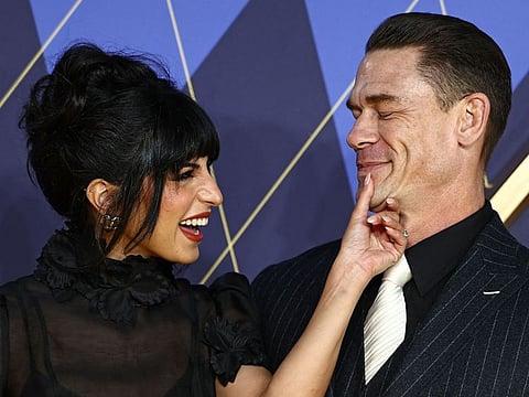 US actor John Cena and Shay Shariatzadeh pose on the red carpet upon arrival to attend the world premiere of the film "Argylle" in central London on January 24, 2024.