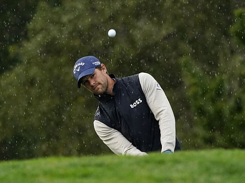 Thomas Detry hits his chip shot on the 18th hole during the first round of the AT&T Pebble Beach Pro-Am at Spyglass Hill Golf Course on Thursday.