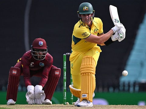 Australias batsman Sean Abbott attempts a reverse sweep during the second ODI cricket match against West Indies at the Sydney Cricket Ground on Sunday.