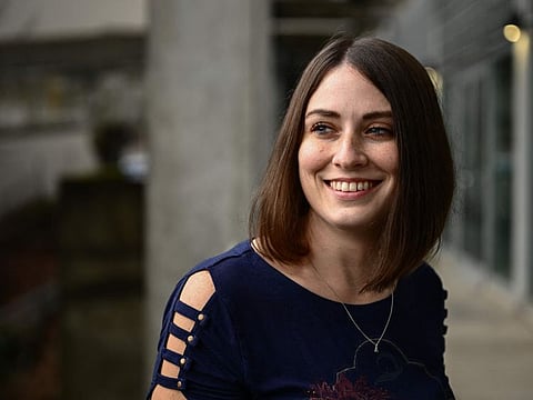 Amber Pearson, who received a brain implant to treat her epilepsy and Obsessive-compulsive disorder (OCD) stands for a portrait at the Oregon Health and Science University (OHSU) hospital in Portland, Oregon on January 23, 2024.