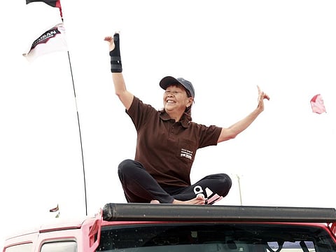 Zeus Azusa Shiraki enjoys a light moment during a pause of the Marshals Drive on February 3 in Tilal Swaihan