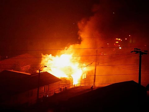 A house burns following the spread of wildfires in Vina del Mar, Chile.