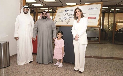 Accompanied by her father, Al Mutairi was present at the bank to oversee the award ceremony and the deposit of KD2 million into her personal account.