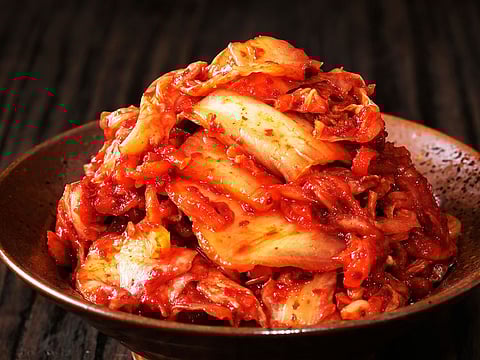 Kimchi is packed with Vitamins A, B and C as well as probiotics. Moreover, it supports digestion and strengthens the immune system.