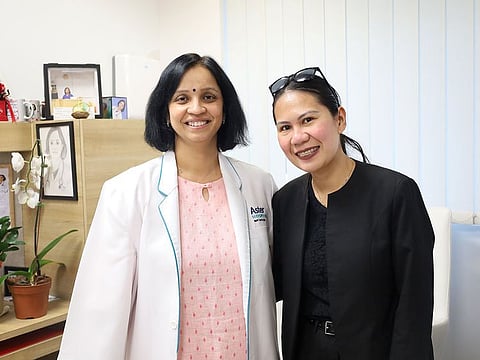 Jessica Delis Santos, right, with Dr. Caroline Alphine Jenitha at Aster Hospital, Mankhool.