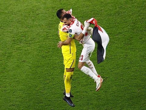 Jordan's Yazeed Abulaila and Ehsan Haddad celebrate after reaching the AFC Asian Cup final.