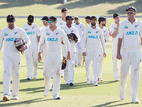 New Zealand players leave the field following their victory on day four of the first cricket Test match against South Africa at the Bay Oval in Mount Maunganui on February 7, 2024.