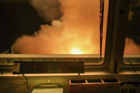 In this photo provided by the Royal Navy a view of HMS Diamond from the ships bridge, firing Sea Viper missiles at an incoming Houthi drone, on the Red Sea, on January 27, 2024.