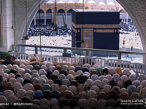 Rows of worshippers pray at the Grand Mosque that houses the Holy Kaaba.