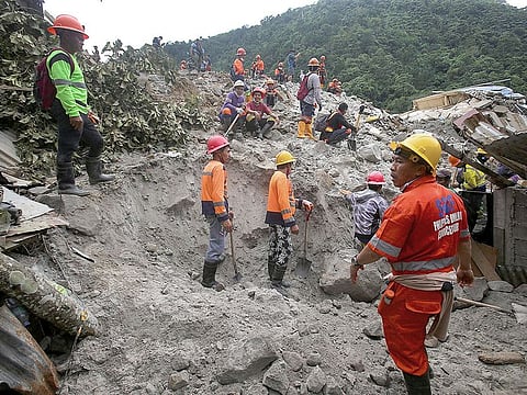 Search and rescue operations continue following a landslide in the village of Masara, Maco, Davao de Oro, Philippines.