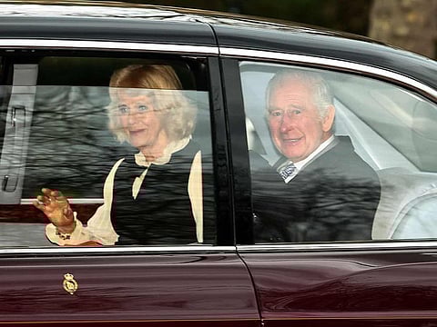 File photo: Britain's King Charles III and Britain's Queen Camilla wave as they leave by car from Clarence House in London on February 6, 2024.