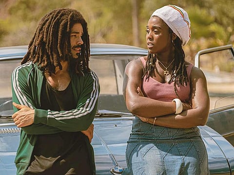 Photo shows Kingsley Ben-Adir, left, and Lashana Lynch in "Bob Marley: One Love."