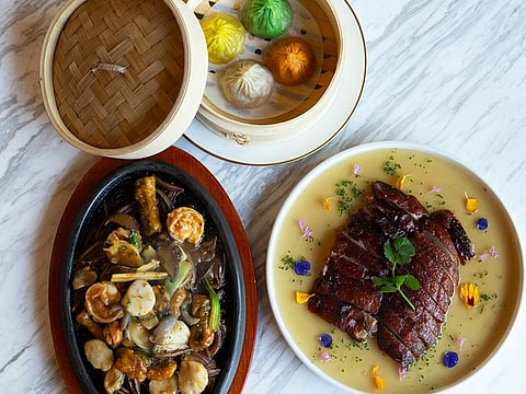 Sizzling in the Ocean, Roasted duck with Lemongrass Sauce, and Xiao Long Bao