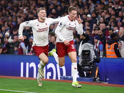 Manchester United's Scott McTominay celebrates scoring their second goal with Rasmus Hojlund against Aston Villa on Sunday.