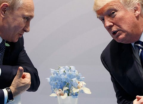 Trump, right, with Russian President Vladimir Putin at the G20 Summit in Hamburg on July 7, 2017.