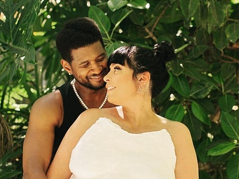 Usher and Jennifer Goicoechea.