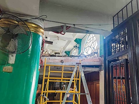 A partially collapsed balcony inside a church in San Jose del Monte, Bulacan.