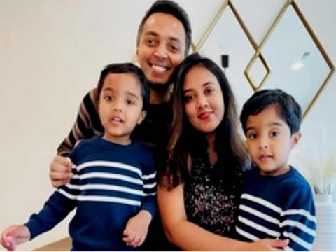 File photo: Anand Sujith Henry with his wife Alice Priyanka, and their sons Noah and Neithan.
