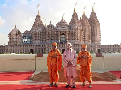 Indian Prime Minister Narendra Modi (centre) in front of the BAPS Hindu Mandir in Abu Dhabi on Wednesday