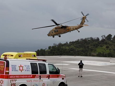 A militrary helicopter transports from Ziv hospital in Israel's northern city of Safed a person wounded in a rocket attack fired from southern Lebanon on northern Israel for urgent treatment on February 14, 2024.