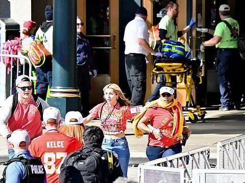 Fans react outside of Union Station after shots were fired after the celebration the celebration of the Kansas City Chiefs winning Super Bowl LVIII.